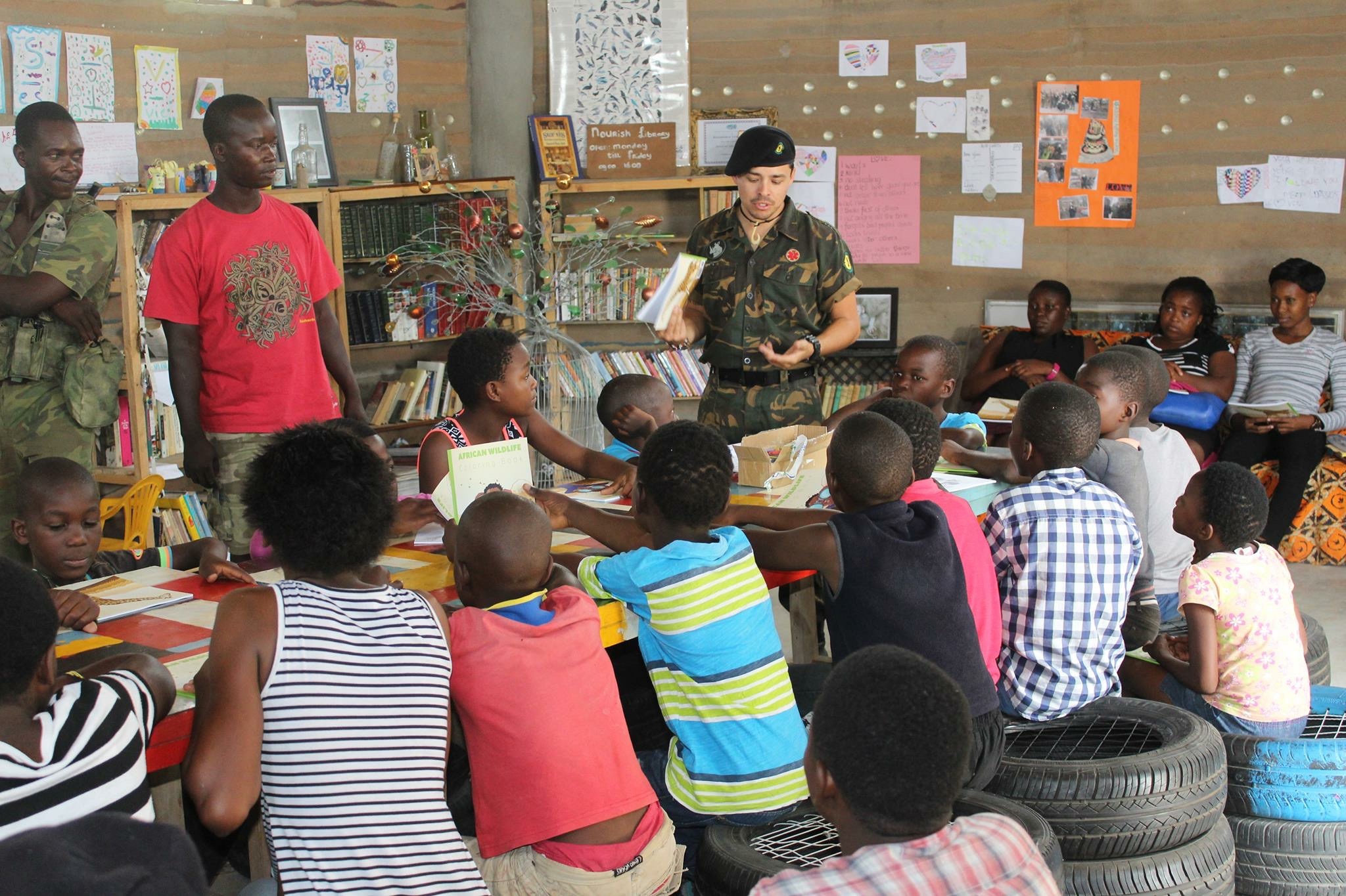 a ranger talks to a classroom of children